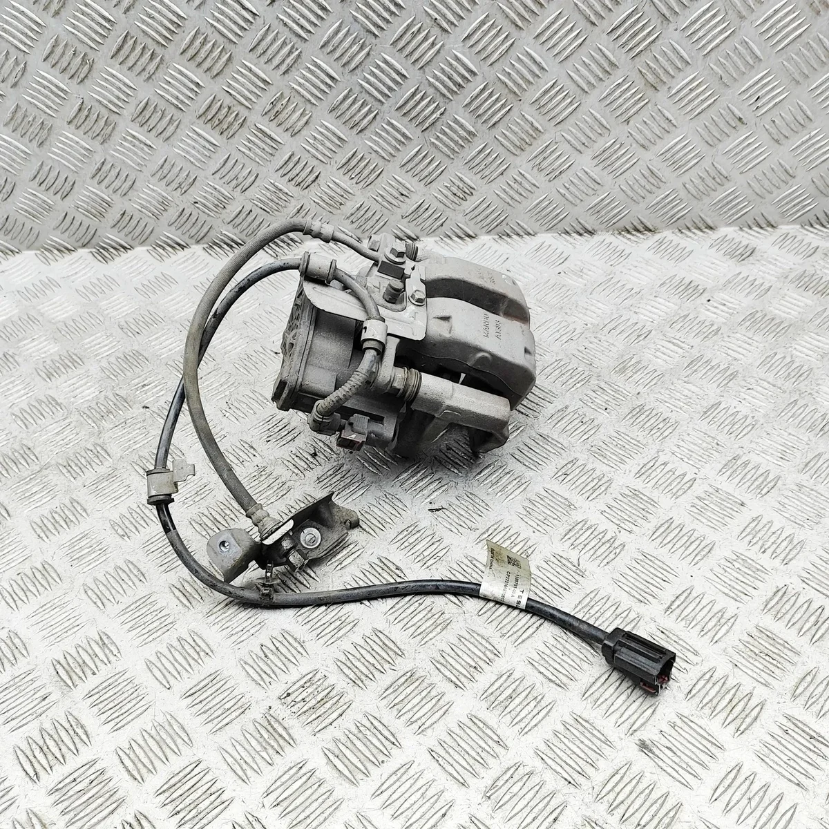 Tesla Model Y Rear brake caliper moto Right detail 1