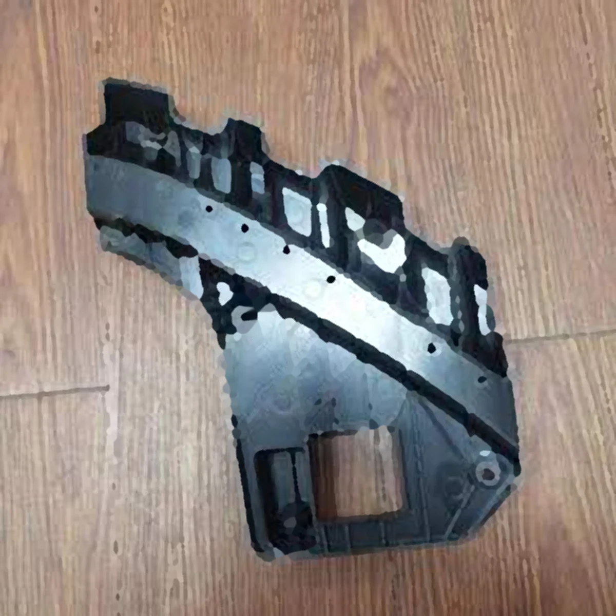 Tesla Model 3/Y 2021 Headlight mounting bracket detail 3